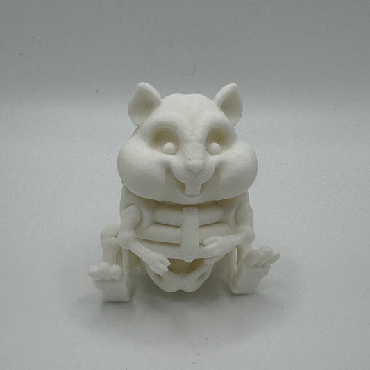White 3D-printed hamster skeleton figurine on a gray background