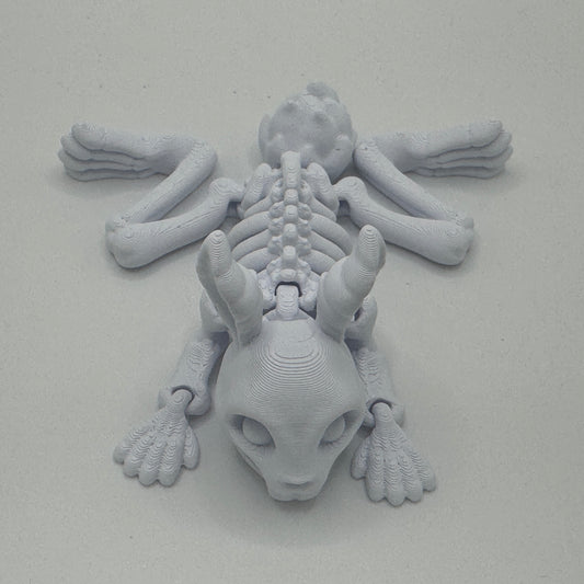3D-printed bunny skeleton model on a plain background
