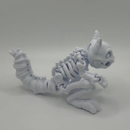 White 3D-printed squirrel figurine on a gray background