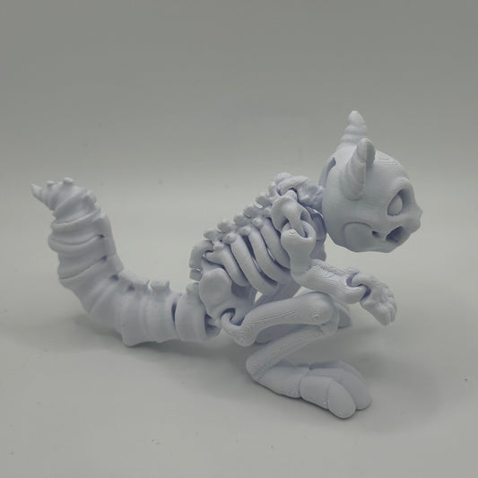 White 3D-printed squirrel figurine on a gray background